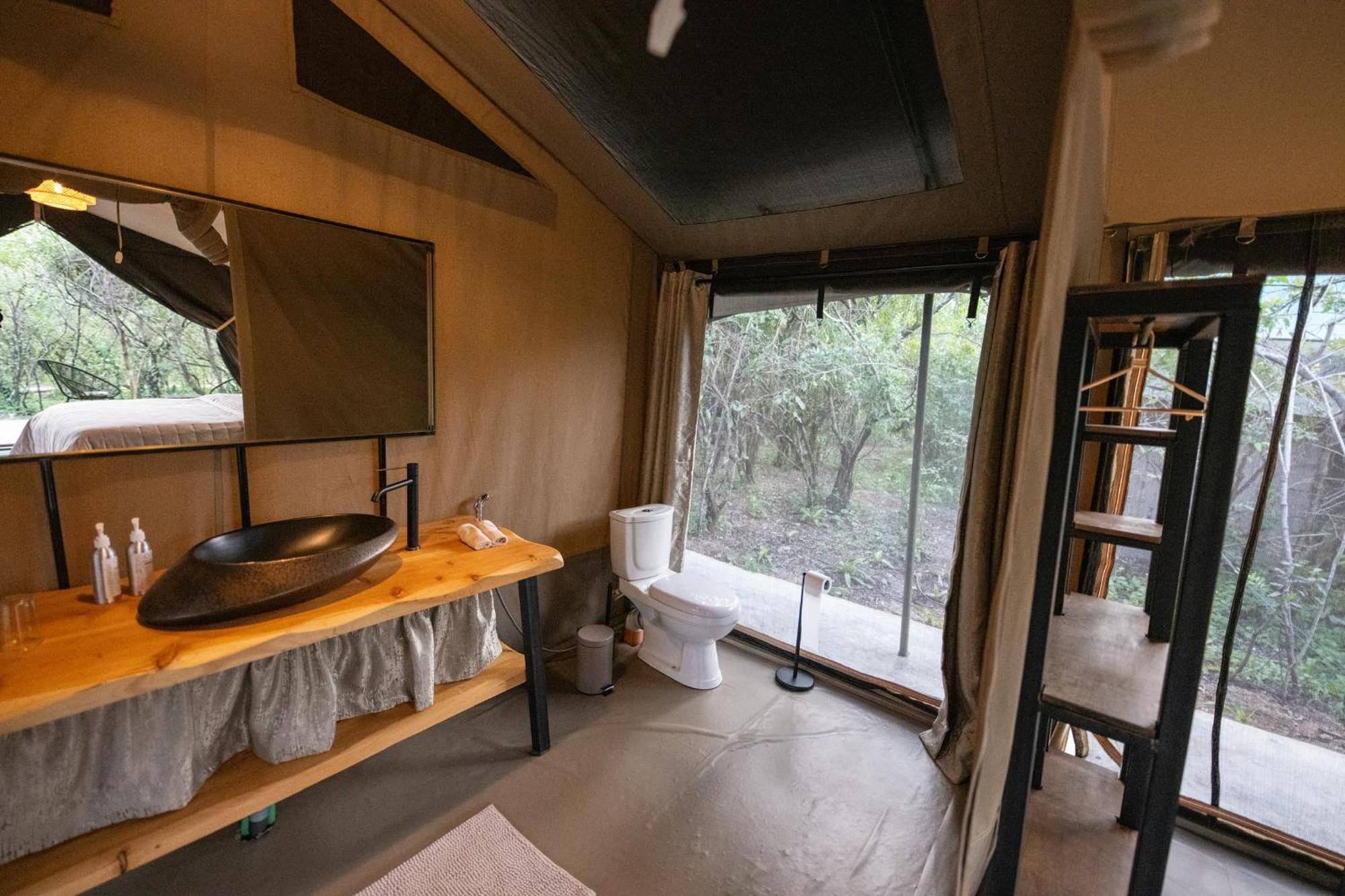 Olkinyei Mara Tented Camp