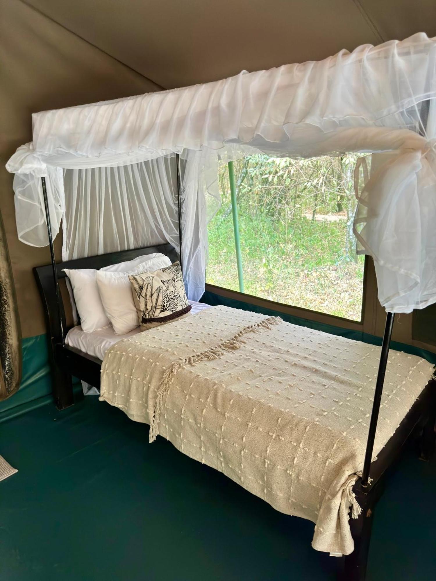 Olkinyei Mara Tented Camp